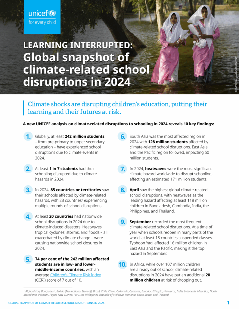 Two young people walk to school through a flooded landscape.