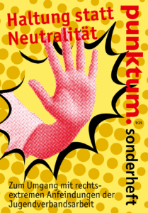 Orange Punkte auf gelbem Hintergrund und eine Hand, die Stopp zeigt.