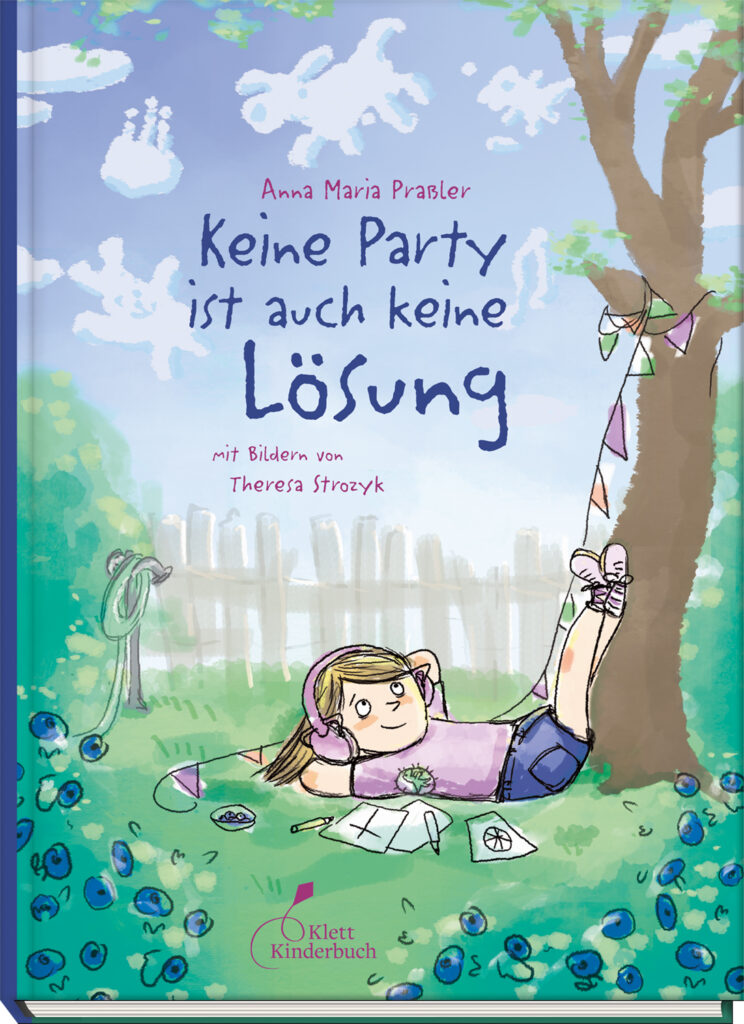 Ein Kind liegt mit Kopfhörern und Partydeko im Gras und träumt von einer Party.