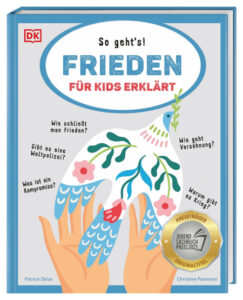 © DK Verlag-Kids Eine bunt angemalte Taube, die für Frieden steht, bewegt sich in den Händen einer jungen Person.